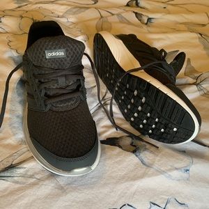 Adidas women shoes. Color: Black. Size: 9 US